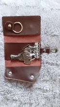 Billetera de cuero genuino de vaca para hombre y mujer, bolsa para llaves multifunción con hebilla de calidad a la moda, organizador de llaves con los titulares de ama de llaves