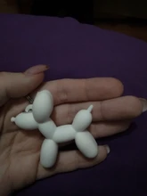 Nuevo creativo de dibujos animados globo de Llavero perro colgante anillo de hombres y mujeres par bolsa de llavero colgante venta al por mayor