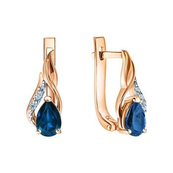 

Gold earrings with Topaz and diamonds sunlight sample 585