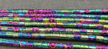 

AAA grade -6x8mm rainbow hematite tube carved moon -star beads 16" strand