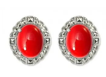

Earrings made of silver with coral imit. And Marcasite