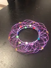 Juguete de descompresión de Mandala para niños, cesta de flores, aro mágico de acero suave Variable