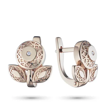 

Earrings in red gold with a diamond