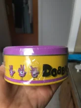 Spot it and dobble-Juego de mesa para niños, tarjetas de punto para acampar, caja de lata de Metal, Juguetes