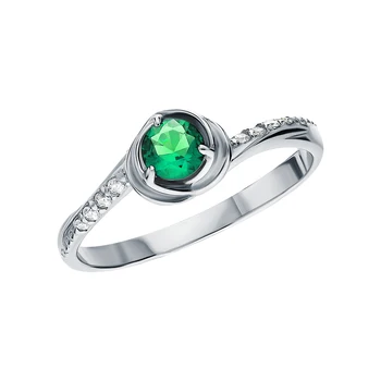

Silver ring with cubic zirconia and emeralds synthetic sunlight sample 925