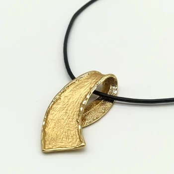 

Women's necklace, gold color with cord.