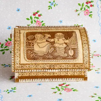 

Bread from birch bark "grandfather Da Baba". A large birch loaf handmade in Russian rustic style.