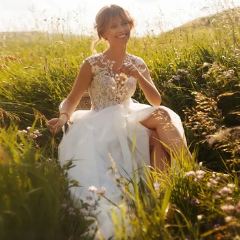 

Puls Size Tulle A-line Wedding Gowns 2020 O-neck Appliques Sweep Train Button Back Sleeveless Bridal Dresses