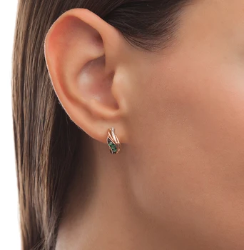 

Gold earrings with emeralds and diamonds sunlight sample 585 test