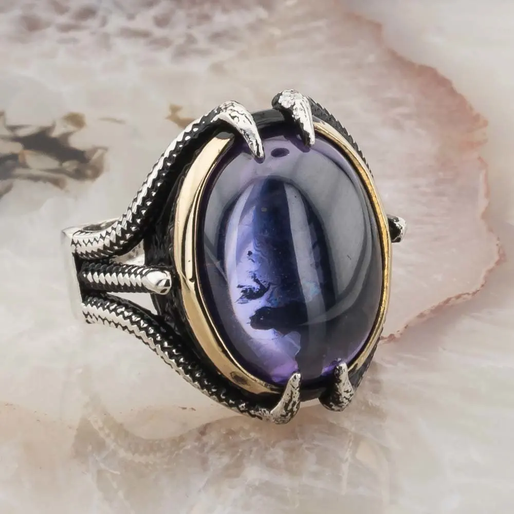 Серебряное кольцо с фиолетовым цирконием