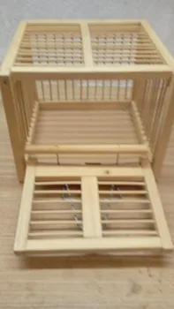 

Wooden trap cage with a side door