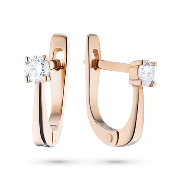 

Earrings in red gold with a diamond