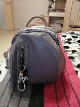 Nueva mochila impermeable de nailon para mujeres, mochilas escolares con cremallera para adolescentes y niñas, mochila colgante pequeña, mochila multifunción femenina