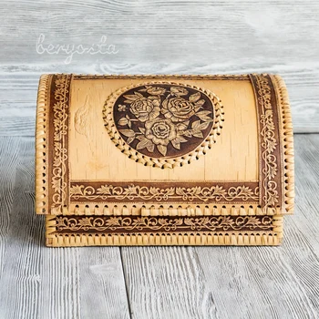 

Breadbasket from birch bark "roses". Birch bread handmade in Russian rustic style.