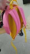 Mochila de grado alto para bebés y niñas, morral escolar 3D antipérdida con dibujos animados para guardería, impermeable de dinosaurios