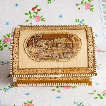 

Bread from birch bark "village". A large birch loaf handmade in Russian rustic style.