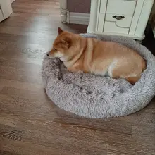 Perro mascota redondo largo de peluche perro camas para perros productos para mascotas cojín Super suave y esponjoso cómodo gato Mat suministros Accesorios