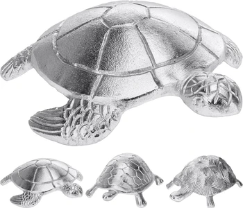 

Figure turtle. Manufactured in METAL. Silver. Dimensions length 23cm x width 23cm x High 5cm. Have 3 different models
