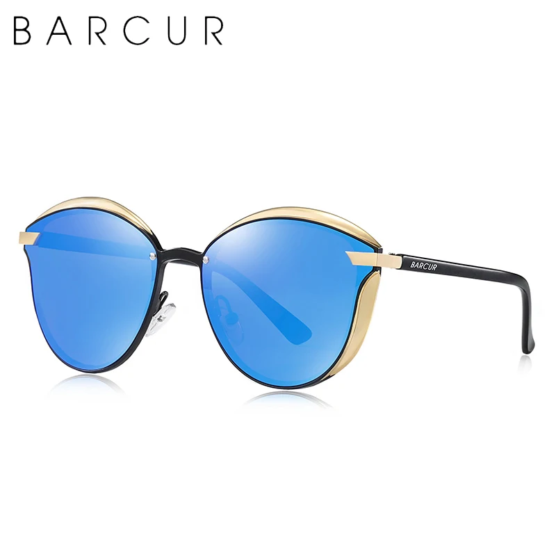 Lunettes anti-lumière bleue portées par une personne devant un écran d'ordinateur, réduction de la fatigue oculaire.