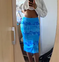 Faldas de estilo informal bohemio para mujer, faldas de cintura alta con estampado Floral, color Naranja, a media pierna, para playa, fiesta y vacaciones