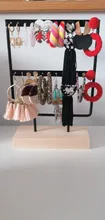 Soporte de exhibición para pendientes de tuerca de Metal con Base de madera, organizador de pendientes con 24/44/66 agujeros, venta al por mayor