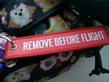 Llavero tejido con etiqueta rótulo de equipaje especial, llavero de cadena roja para regalo de aviación, OEM, joyería de moda