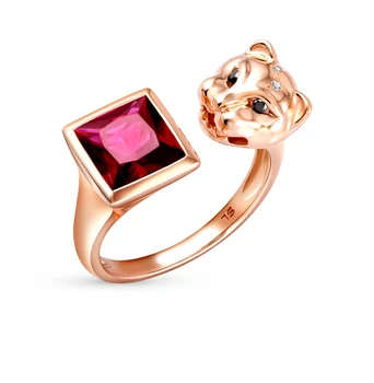 

Gold ring with black diamonds, rhodolites and diamonds sunlight sample 585 test