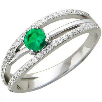 

Esthete ring with cubic zirconia and emerald of silver