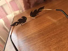 De lujo de ojo de gato gafas de sol de las mujeres Vintage de diseñador de marca sin montura fuego gafas de sol de moda lente espejo estrecha gafas UV400