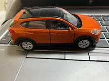 Modelo de coche de aleación para niños, escala 1:36, gran imitación, Hyundai Tucson, modelo de metal fundido a presión, regalo para niños, Envío Gratis