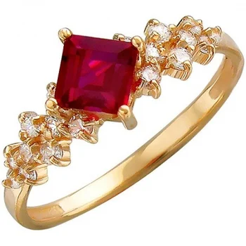 

Esthete ring with spinel, cubic zirconia in red gold