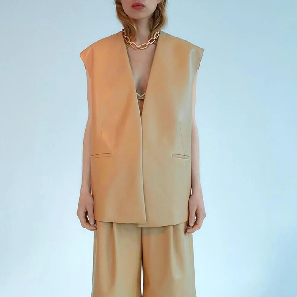 

spring new women's collarless design imitation leather loose vest