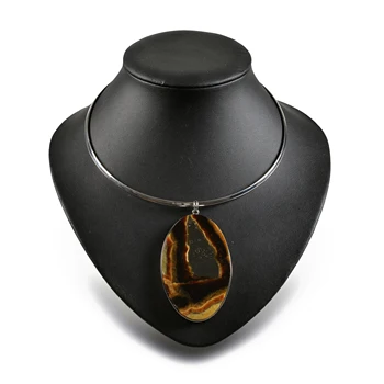 

Pendant with natural stone Simbircite. Frame of nickel silver