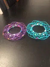 Juguete de descompresión de Mandala para niños, cesta de flores, aro mágico de acero suave Variable