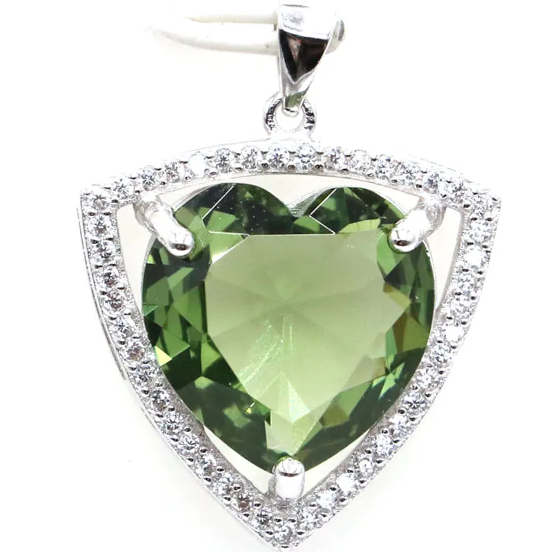 

Кулон из серебра 5,5 пробы с зеленым аметистом, фиолетовым танзанитом, 925 г