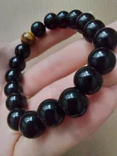 Ónix negro Natural con ojo de tigre piedra perlas pulsera de la joyería de los hombres 12 constelación de Leo los amantes pulsera Energy Balance