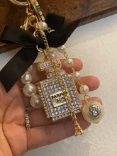 2020 nuevo de imitación de la perla botella de Perfume con llavero coche Soporte para Llavero bolsa encanto colgante accesorios arco clave Cadena de llavero