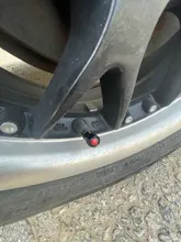 HAUSNN-Tapas de válvula con Logo de Punisher, accesorios para llantas de coche, cubiertas de tallos de estilo automático para Ford, Toyota, Audi y VW, color blanco/rojo