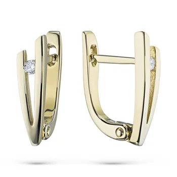 

Earrings in yellow gold with a diamond