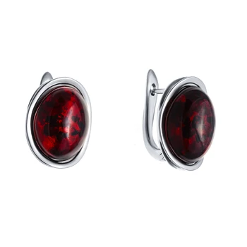 

Earrings made of silver with Amber cognac