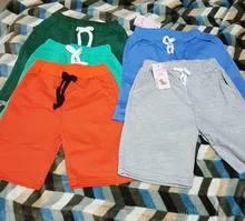 Pantalones cortos de algodón para niños y niñas, pantalones cortos lisos con cintura elástica, deportivos, a la moda, ropa de playa