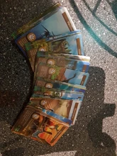 Juego de cartas de cognición de dinosaurios de Disney, 55 Uds., Cartas coleccionables de Anime de batalla, álbum de libros, juguetes para niños, regalos mayor de 3 años 8,7x6,3 cm