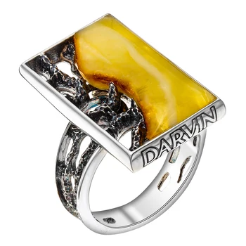 

Silver ring with Amber White