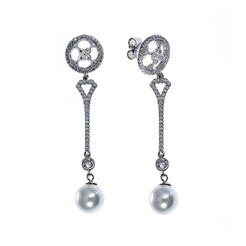 

Earrings made of silver with pearls and cubic zirconia