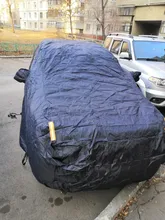 X Autohaux-Cubierta de tela impermeable para el coche, funda universal transpirable, con espacio para los espejos, en color negro, ofrece una protección tanto en invierno como en verano