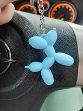 Nuevo creativo de dibujos animados globo de Llavero perro colgante anillo de hombres y mujeres par bolsa de llavero colgante venta al por mayor