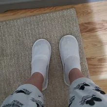 Zapatillas de viaje para Hotel para hombre y mujer, zapatos de uso doméstico, con punta cerrada esponjosa, desechables, Color sólido, 10 pares