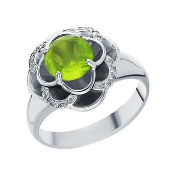 

Silver ring with хризолитом, cubic zirconia and jewelry glasses sunlight sample 925
