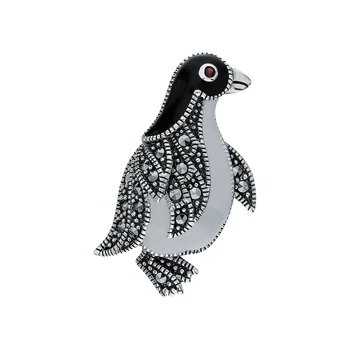 

Silver brooch with marcasite, Garnet and enamel sunlight