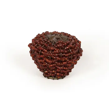 

Box with 10 knobs ethnic style, made in steel and 40 mm in diameter.